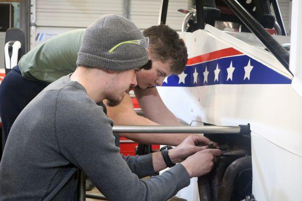 Students working on a Sprint Car as part of the High Performance program.