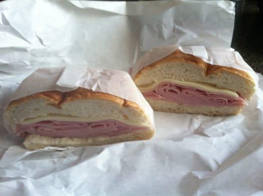 Ham and mozzarella cheese on a roll.