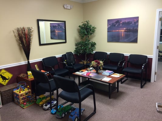 This is the waiting room and kid area. You shouldn't wait long but feel free to play with the toys too.