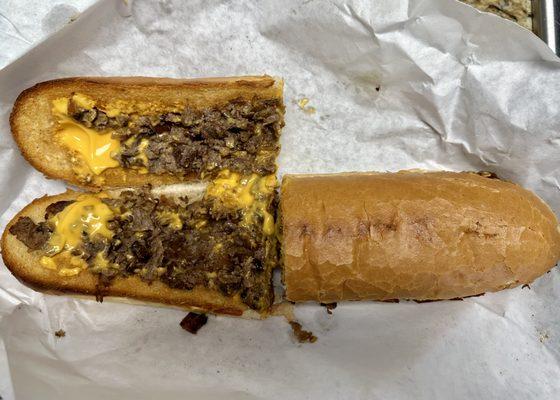 Cheddar-steak hoagie (one half opened)