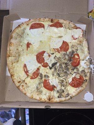 Large white pizza with mozzarella&tomato, half mushroom