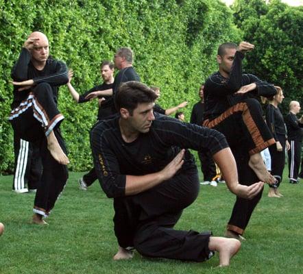 Instructors practicing a Snake Form