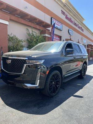 Custom colored 24" Ashanti rims with Nitto recon grapplers