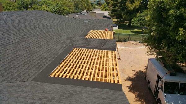 Gray Shingle roof with a lattice patio cover tie in