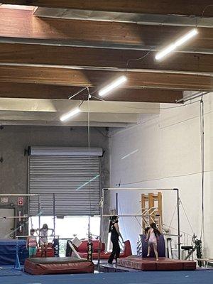 Girls enjoying gymnastics ‍ on balancing bars