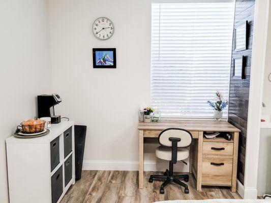 Our massage room at Yellow Rose is a calm and welcoming space -- we even have a desk if you need to return a quick email!