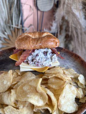 The Heritage chicken salad, croissant paired with deep river chips