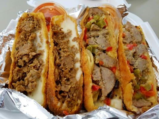 Philly cheese steak and sausage and peppers fried egg rolls from World Famous food truck.