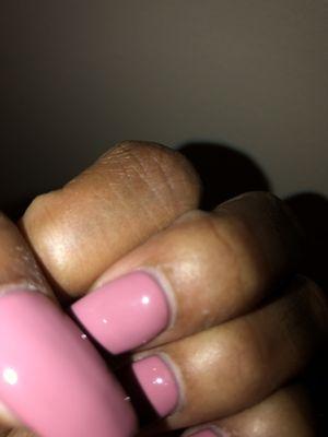 Acrylic was not started at the cuticle. I can comfortably slide my nail through the space. This is 2 hrs after application.