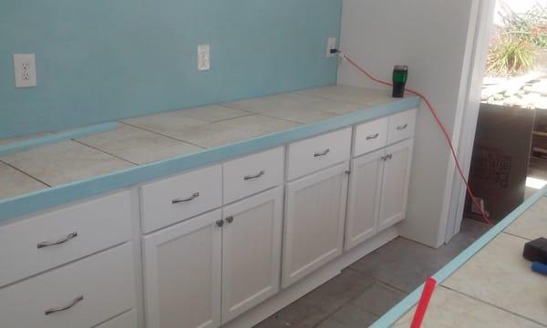 Custom cabinets made out of pvc trim boards for pool cabana