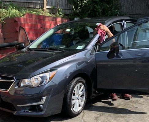 Everything is done by hand! At least 5 gentlemen cleaned my car. Perfection!