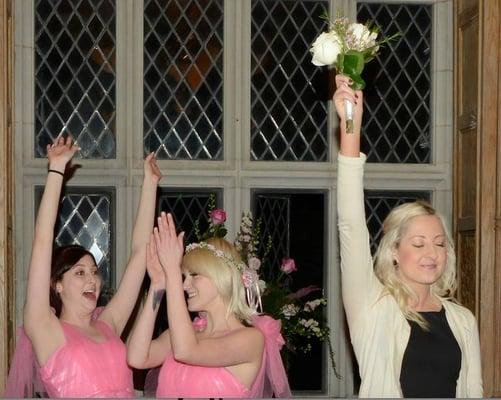 Catching the bouquet like a boss.