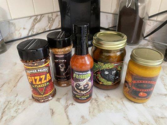 Pizza Flakes, Reaper Seasoning, Ghostly Garlic Fusion, Sickle Pickles, and Habanero Mustard.