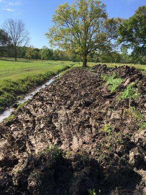 Leveling off the ditch bank