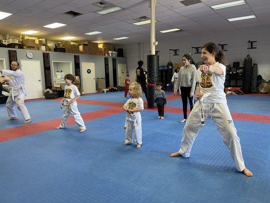 The entire family training on the mat together. This is priceless.