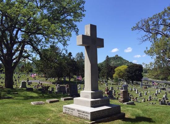 Beautiful Tree Foliage with Views of Sugar Loaf Bluff from with in Saint Mary's Cemetery of Winona