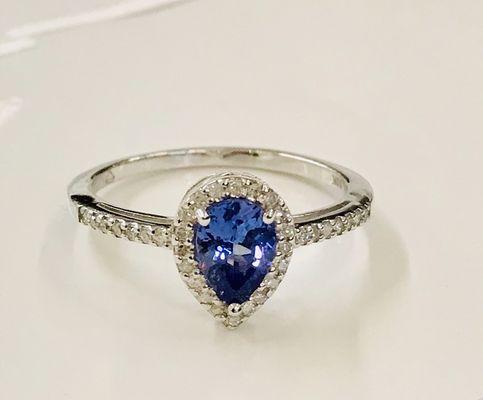 Tanzanite and diamond ring set in 14k white gold.