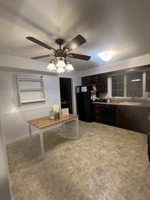 Installed the chair-rails and repainted kitchen from blue to white.