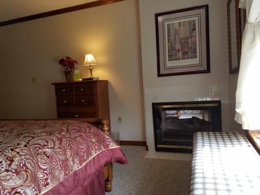 California Suite bedroom with fireplace