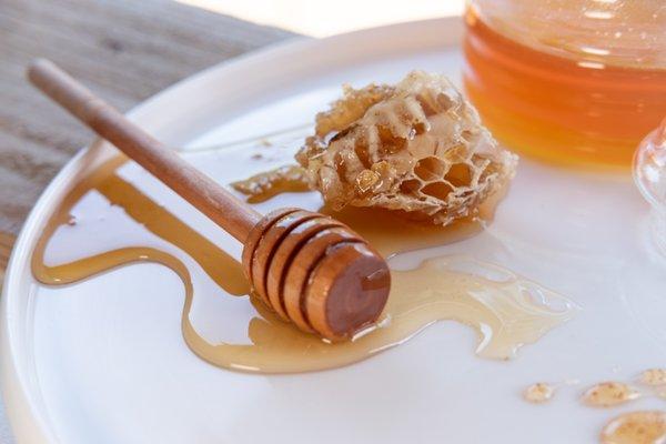 Our Honey Topping is super fresh from our bees on the property! You can get fresh honey or home made hot honey on top of any ice cream