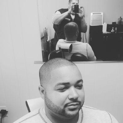 My Barber, Loui V.Lou'cho. Always keeps me looking Crispy Clean (razor work) is on point.