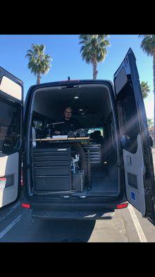 Jr at work in his van