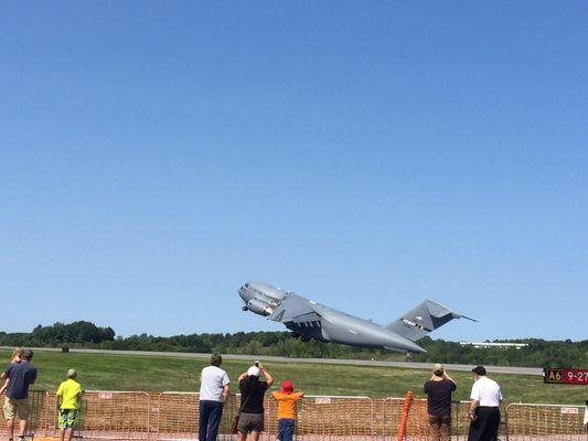 C-17 taking off.  Incredible how that monster leaves the ground so quickly and gracefully.