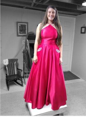 Prom gown hemmed and taken in on the sides.