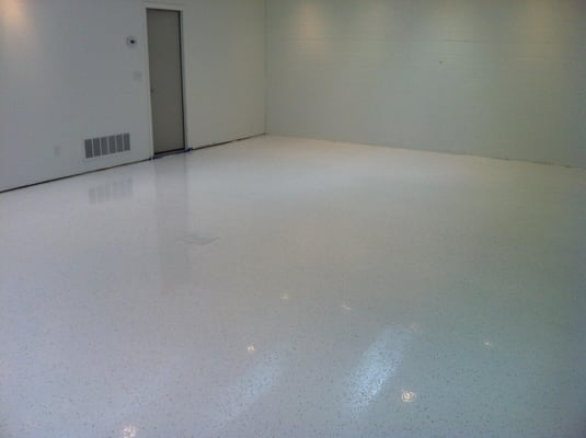 white epoxy floor for an art studio