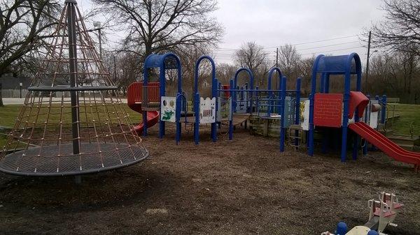 playground is about a foot lower than the surrounding lawn