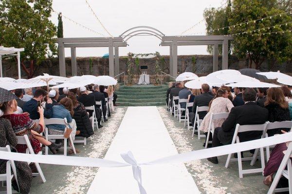 Umbrellas handed to all the guests when it started to drizzle