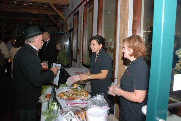 Pizza Chef of Millbury serving up pizza slices at Heritage Starlight