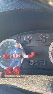 Our stretchy Captain America stress toy purchased at our favorite Speedway - trying and failing to fix our power steering