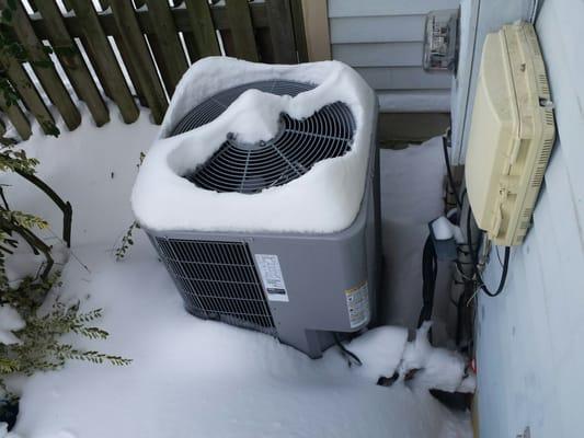 Air outdoor unit fit on the existing rack 16" off the ground.  DC great blizzard January, 2016