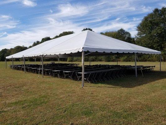 40x80 Tent 8' tables and brown folding chairs