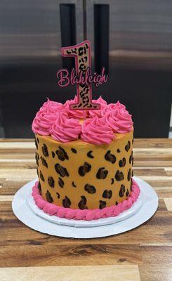 Leopard print, strawberry cake with vanilla buttercream.