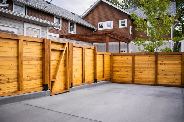 Custom built cedar fence for privacy and to enhance outdoor living area.