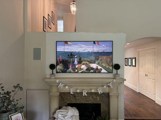 65" Samsung Frame with a 5.1 surround sound system. Powered by a Yamaha receiver.