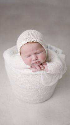 baby girl in bucket