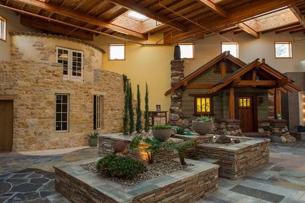 Two of the full scale house fronts inside our Showroom featuring bluestone, cultured stone and walnut veneer.