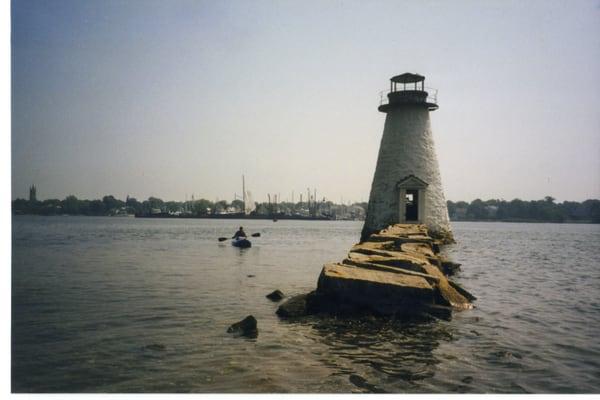 A scruffy yakker next to the lighthouse