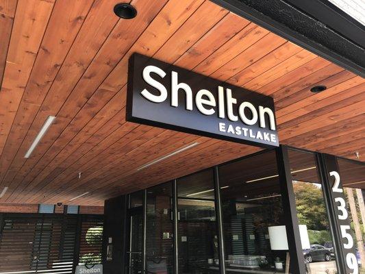 Cabinet sign with dimensional letters for Shelton Apartments in the Eastlake neighborhood of Seattle.