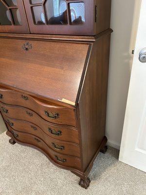 Damaged antique secretary.