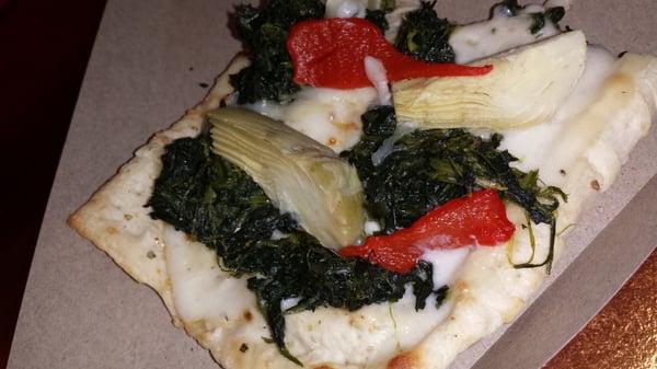 Great tasting flatbread with artichoke hearts, bell peppers, spinach, and cheese.