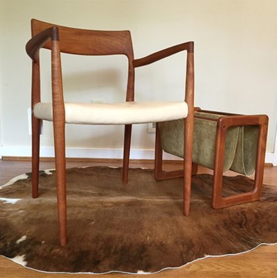 Neils Moller Chair with Teak Magazine Rack on Cowhide Rug