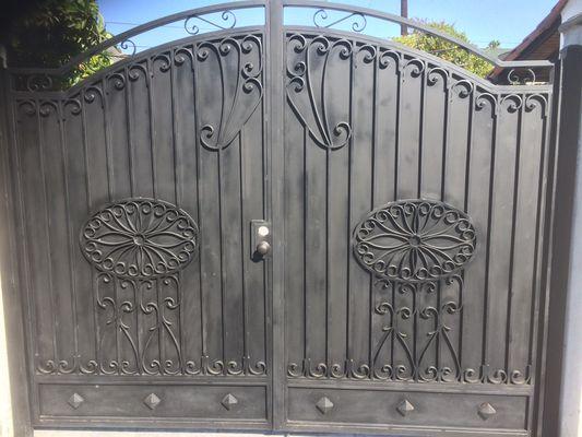 Gate with design and sheet metal to cover inside the house