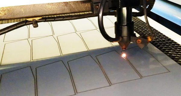 laser machine cutting mirrors.