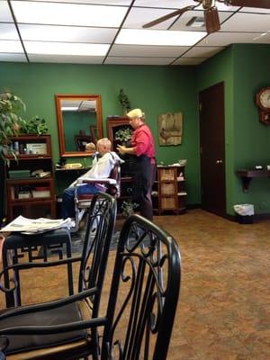 LeAnne doing her usual great job of cutting hair.