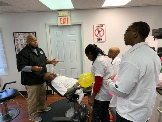 Instructor Fultz teaching a shaving class