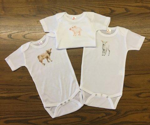 Baby onesies with photo quality imaging using our dye sublimation process.